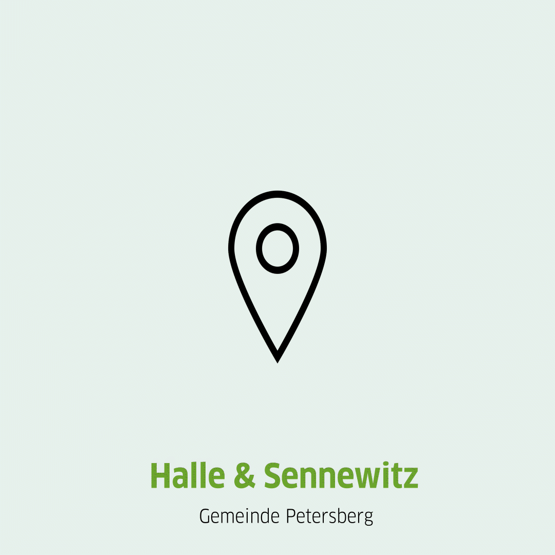 Springende Pinnnadel und Aufschrift des Standortes Halle/ Sennewitz