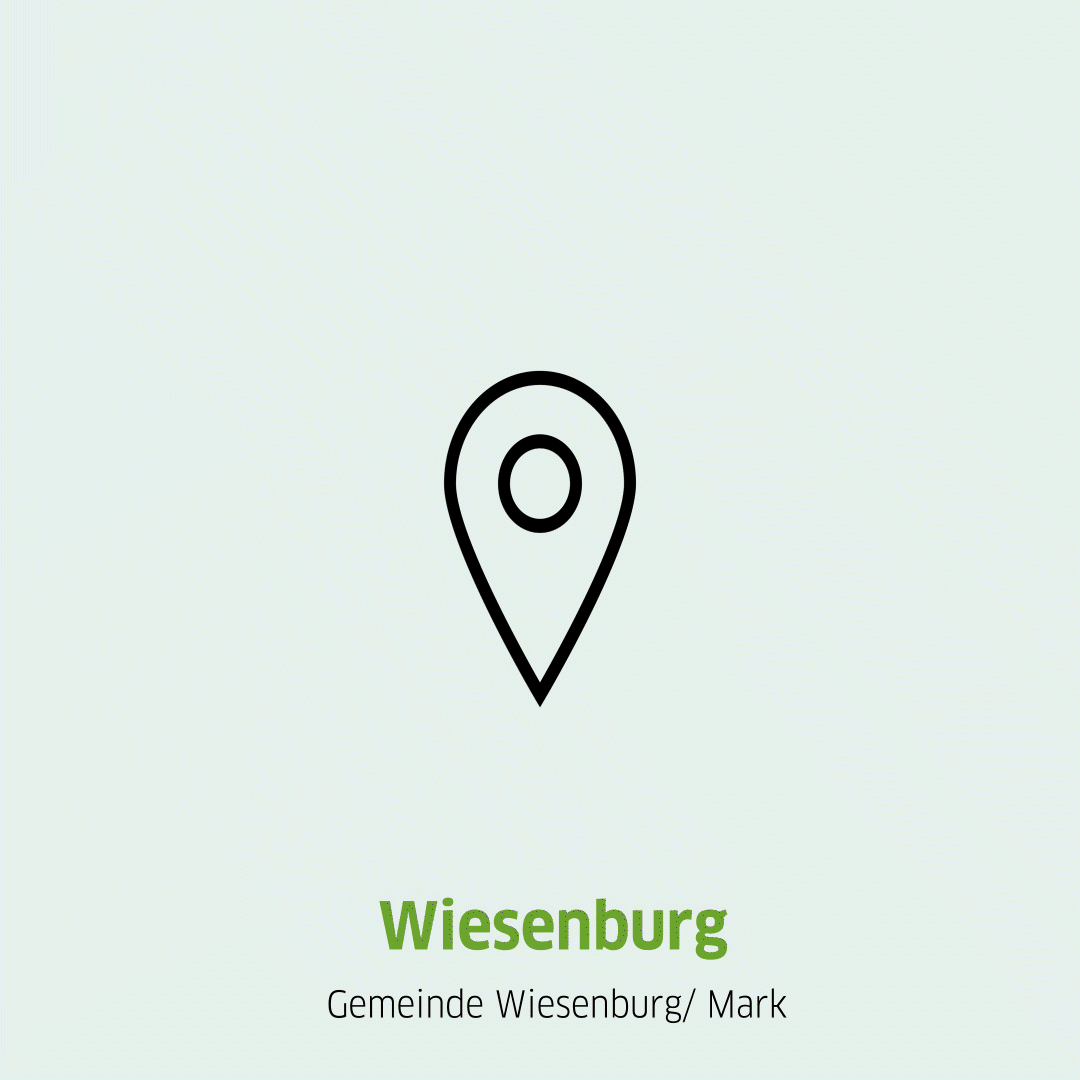 Springende Pinnnadel und Aufschrift des Standortes Wiesenburg